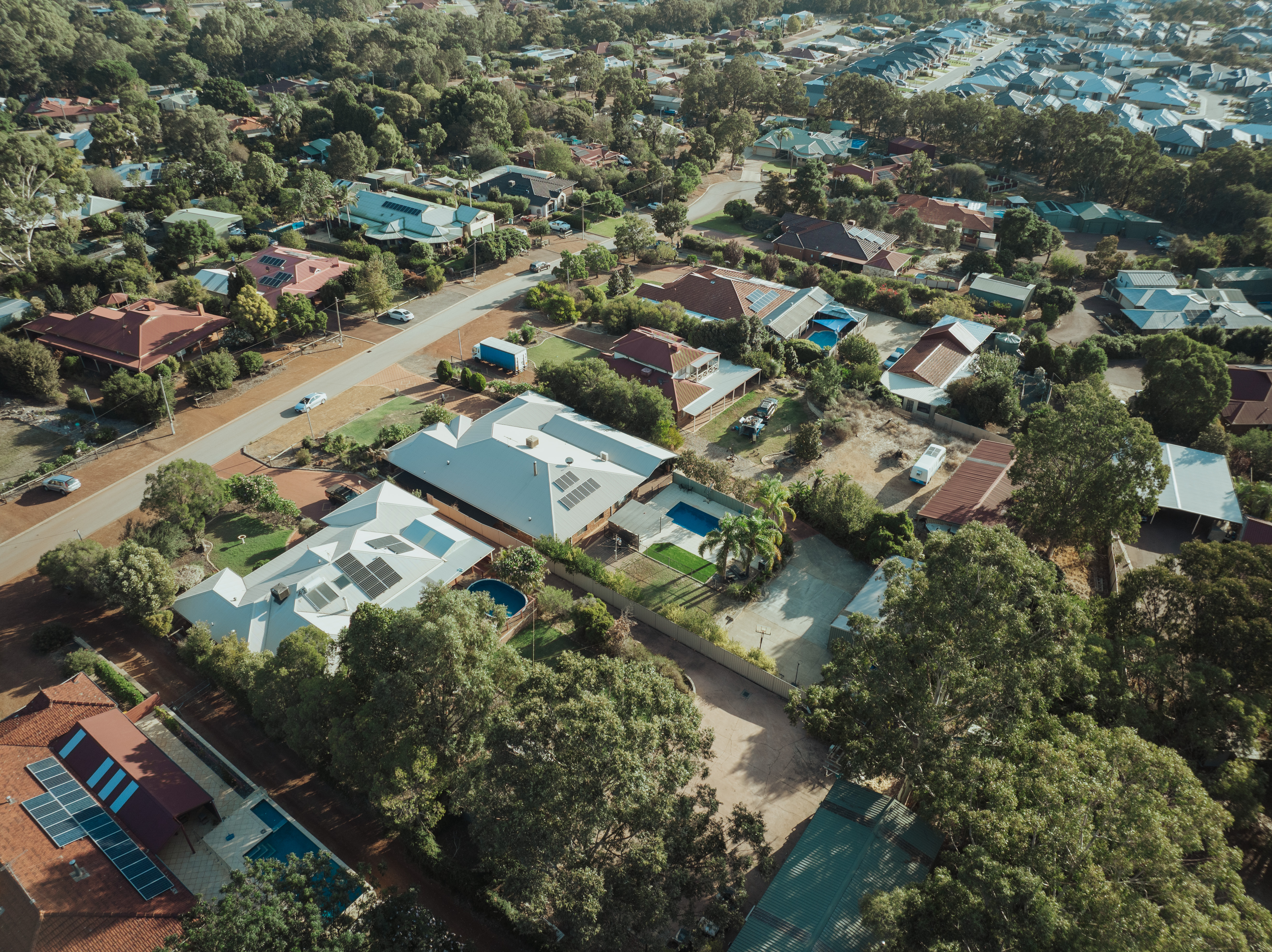 Aerial drone photograph of a premium Australian suburb shot by Estate Acquisition